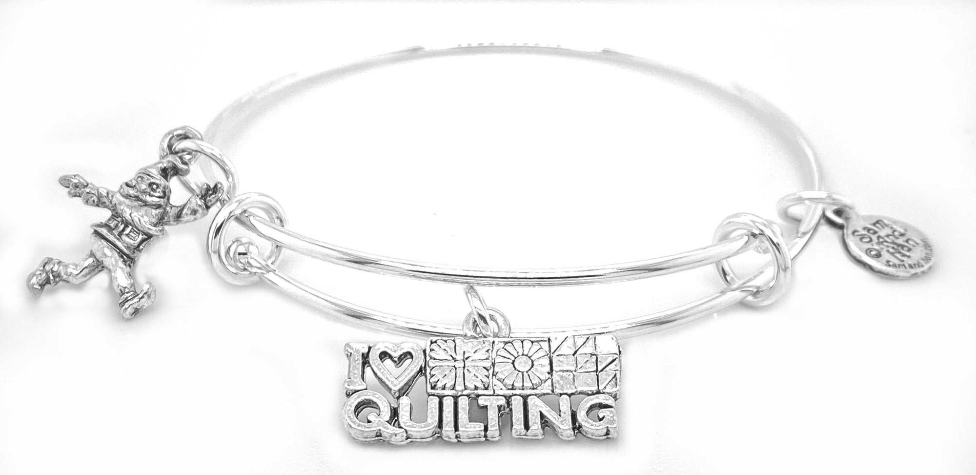Sewing quilting silver bangle with I love quilting and elf charm
